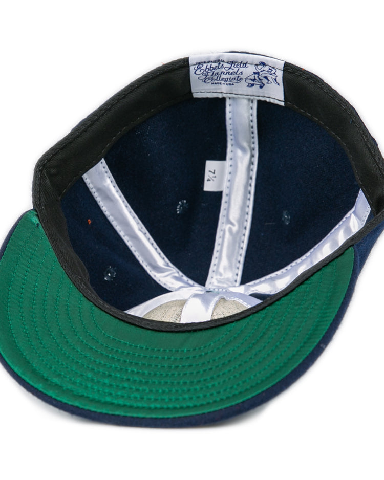 The Ebbets Field Flannels West Virginia University 1966 Vintage Ballcap in navy features a green underbrim, white lining, an inner label, and size 7 1/4—capturing the classic Mountaineers look.