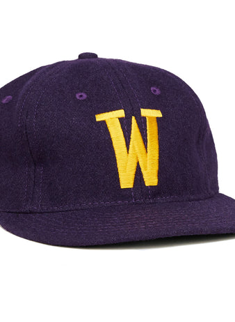 The EFF Williams College 1960 Vintage Ballcap is a purple wool hat featuring a yellow embroidered W on the front—ideal for collectors and fans of Williams College.
