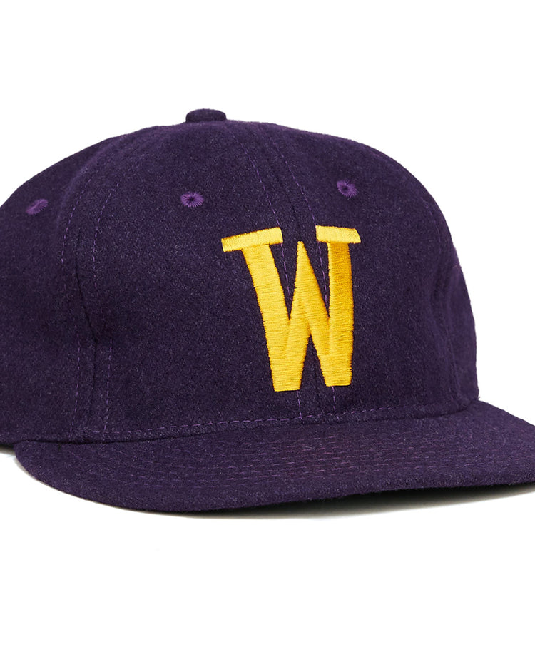 The EFF Williams College 1960 Vintage Ballcap is a purple wool hat featuring a yellow embroidered W on the front—ideal for collectors and fans of Williams College.