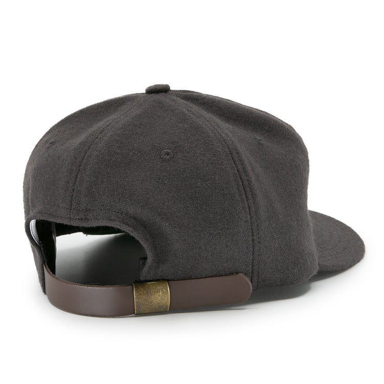 The image shows the back view of the EFF Young Democrats 1972 Vintage Inspired Ballcap in dark gray, featuring a curved brim and a brown leather adjustable strap with a brass buckle.