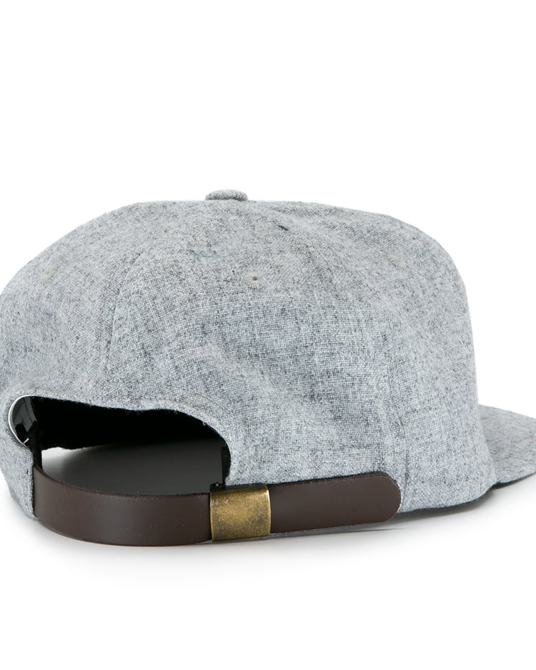 The EFF Hoboken Young Democrats 1972 Vintage Ballcap features light gray fabric, a dark brown adjustable strap with brass buckle, and is inspired by classic Little League wool baseball caps.