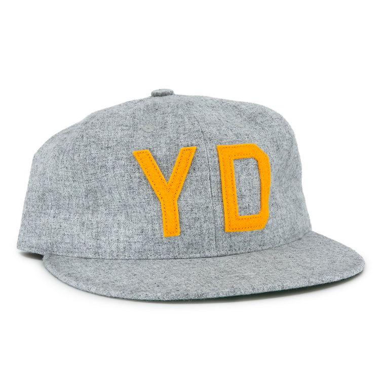 The EFF Hoboken Young Democrats 1972 Vintage Ballcap is a gray wool hat with bold yellow Y and D letters, inspired by the classic Little League style and the original 1972 Hoboken Young Democrats cap.