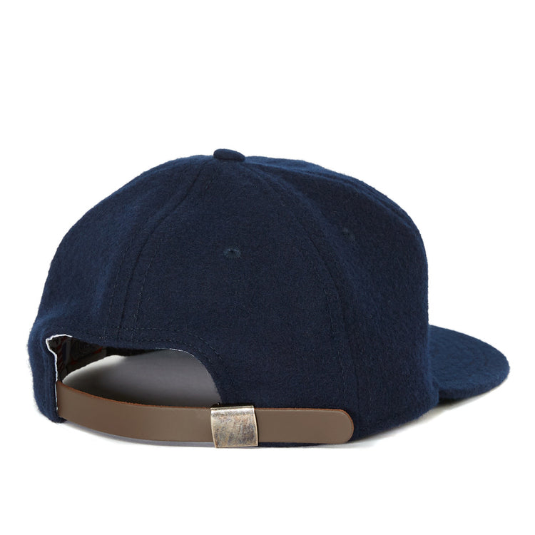 The EFF Gonzaga University 1971 Vintage Ballcap, shown from the back in navy blue, features a brown adjustable strap with a silver buckle—an authentic reproduction ideal for any Gonzaga ballcap collection.