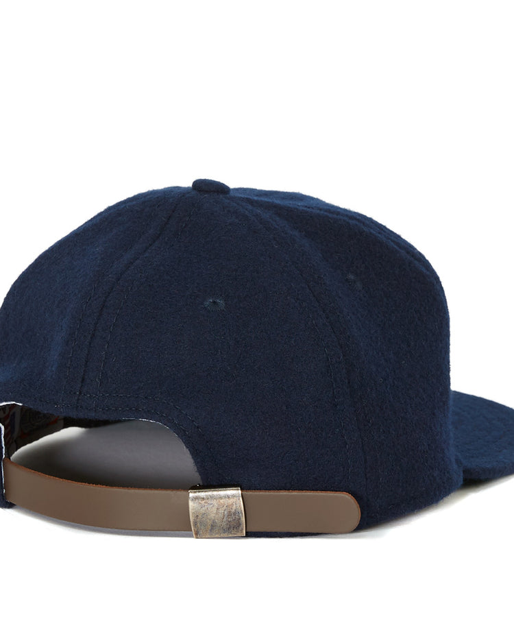 The EFF Gonzaga University 1971 Vintage Ballcap, shown from the back in navy blue, features a brown adjustable strap with a silver buckle—an authentic reproduction ideal for any Gonzaga ballcap collection.