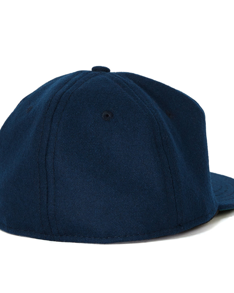 The EFF San Francisco Missions 1935 Vintage Ballcap is a dark blue wool baseball cap with visible stitching and a flat brim, shown from the back on a white background.